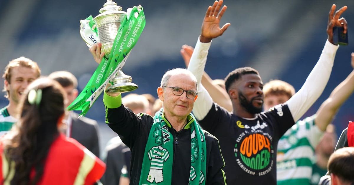 Celtic manager celebrating with trophy and fans Celtic manager celebrating with trophy and fans