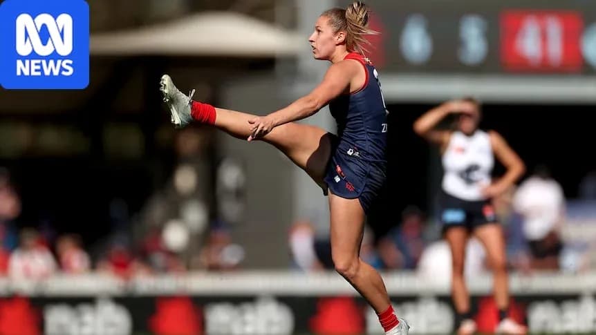 Player kicking the ball during a match Player kicking the ball during a match