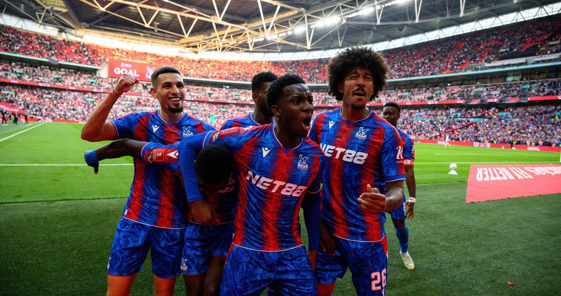 Crystal Palace players celebrating a goal at Wembley Crystal Palace players celebrating a goal at Wembley