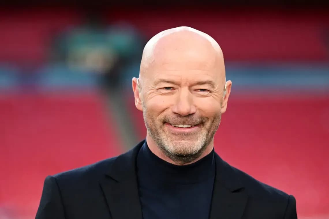 Bald man in a suit smiling at camera Bald man in a suit smiling at camera