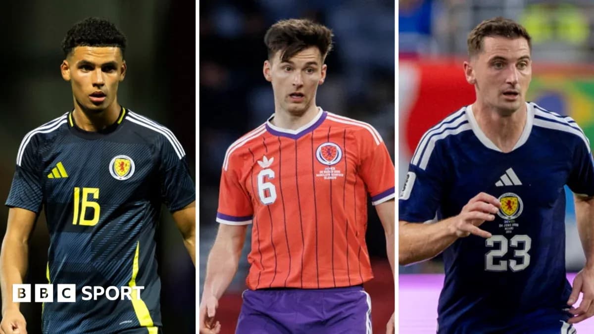 Three Scottish football players in team jerseys Three Scottish football players in team jerseys