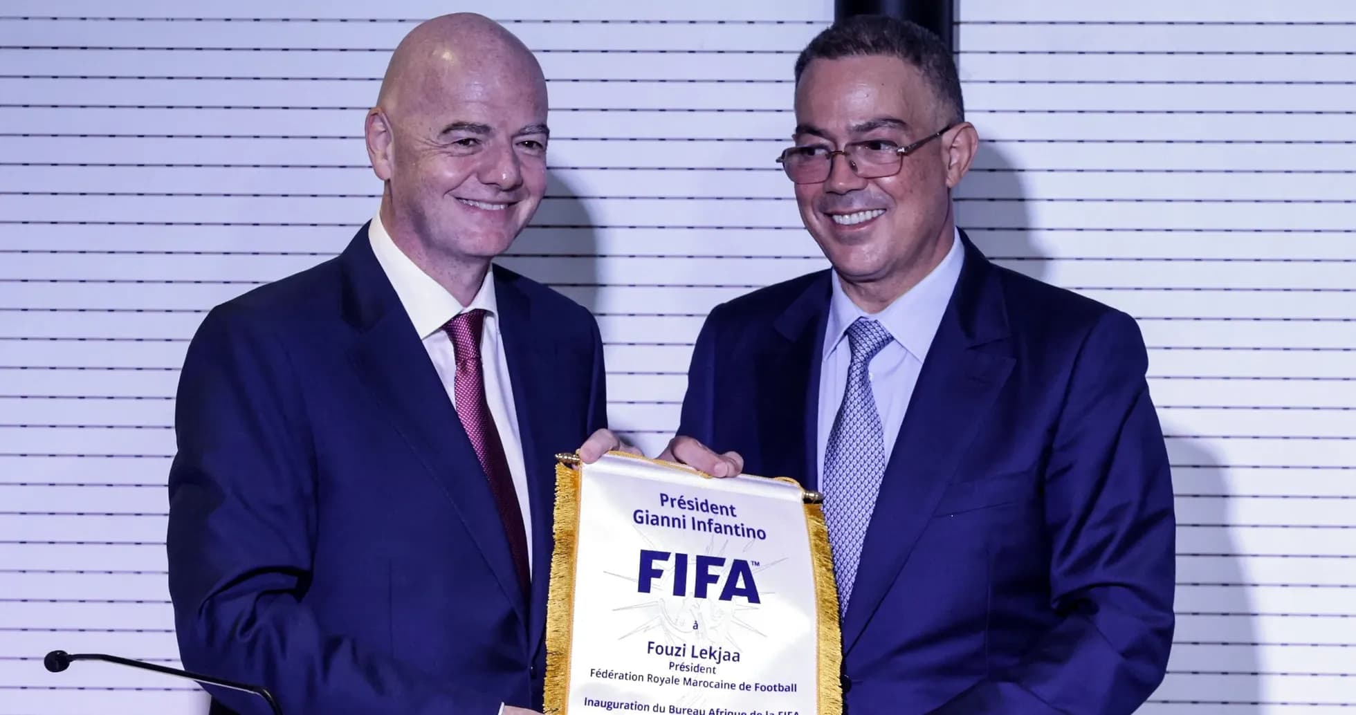 Gianni Infantino presenting award to Fouzi Lekjaa Gianni Infantino presenting award to Fouzi Lekjaa