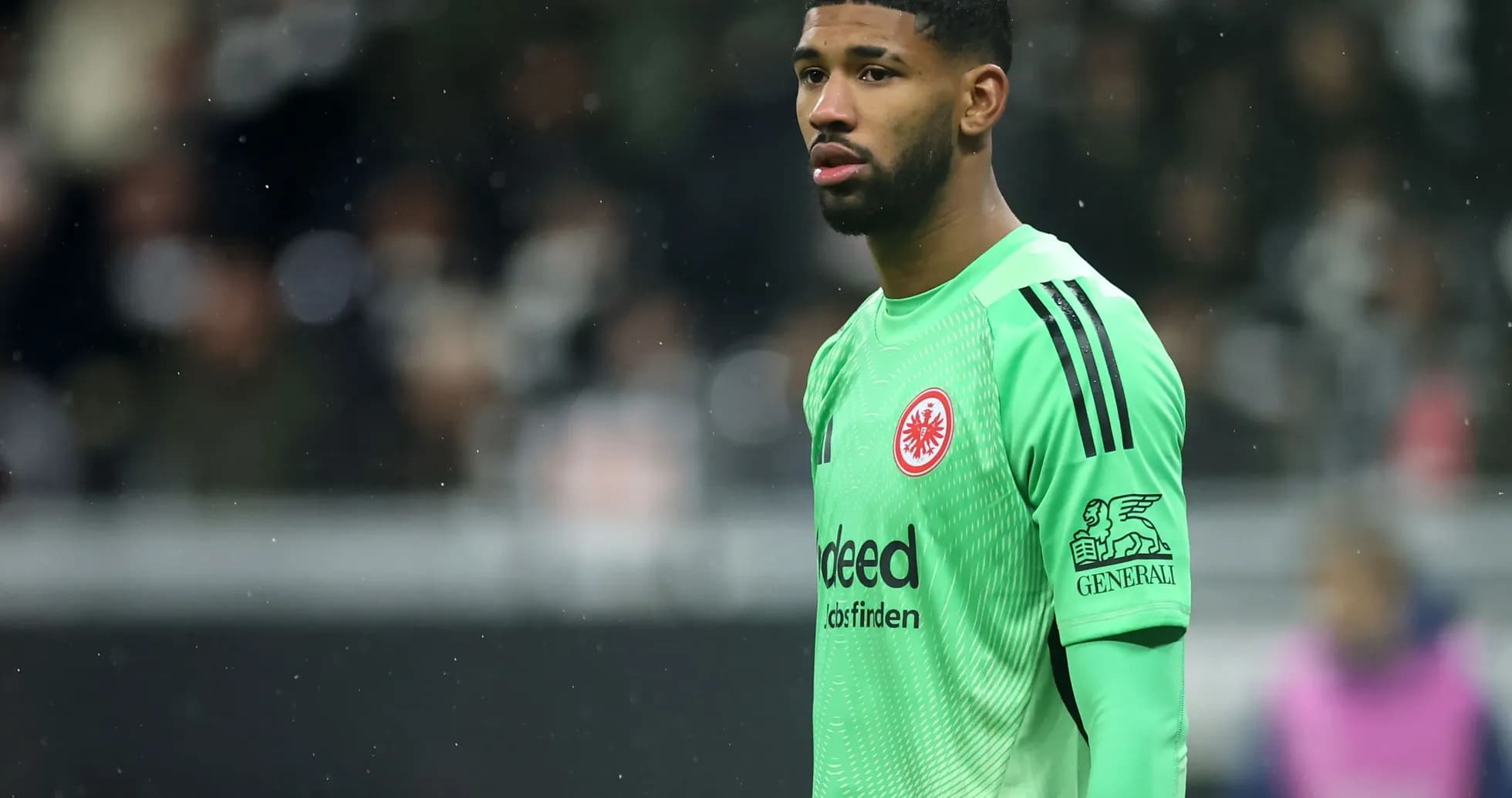 Goalkeeper wearing green jersey during match Goalkeeper wearing green jersey during match