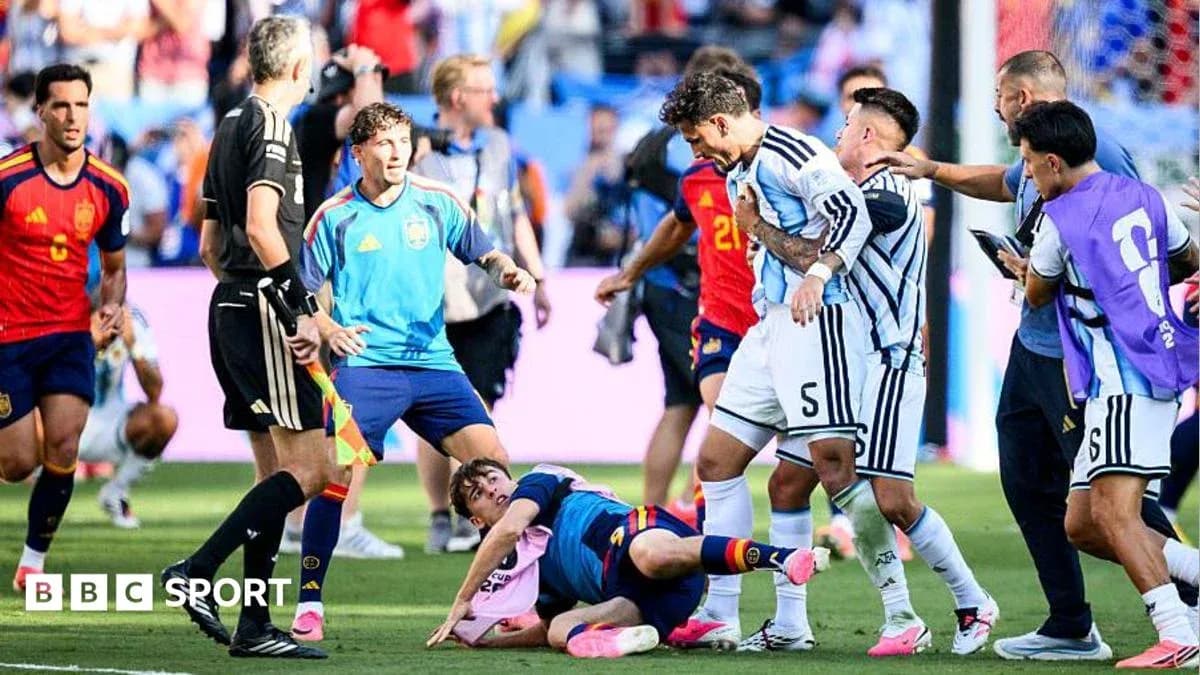 Players from Argentina and Spain arguing on the field Players from Argentina and Spain arguing on the field