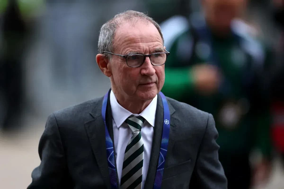 Men's football coach arriving at stadium event Men's football coach arriving at stadium event