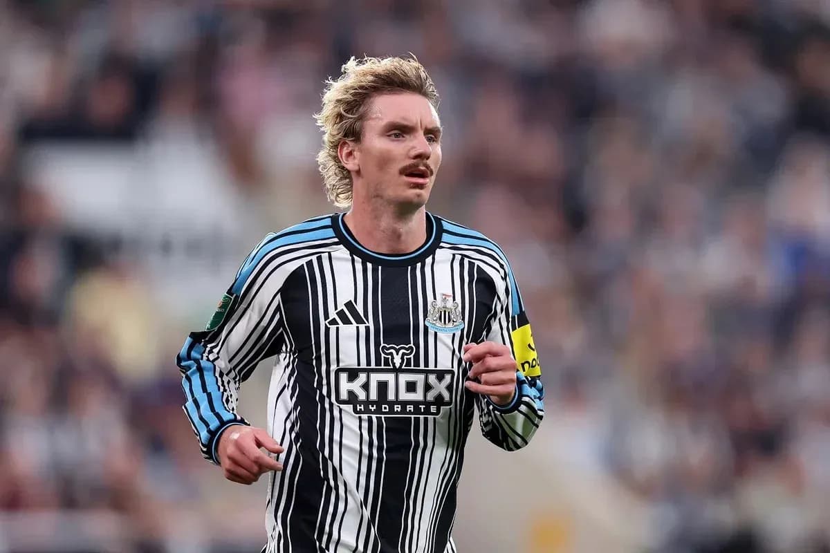 Newcastle player running on the pitch during match Newcastle player running on the pitch during match