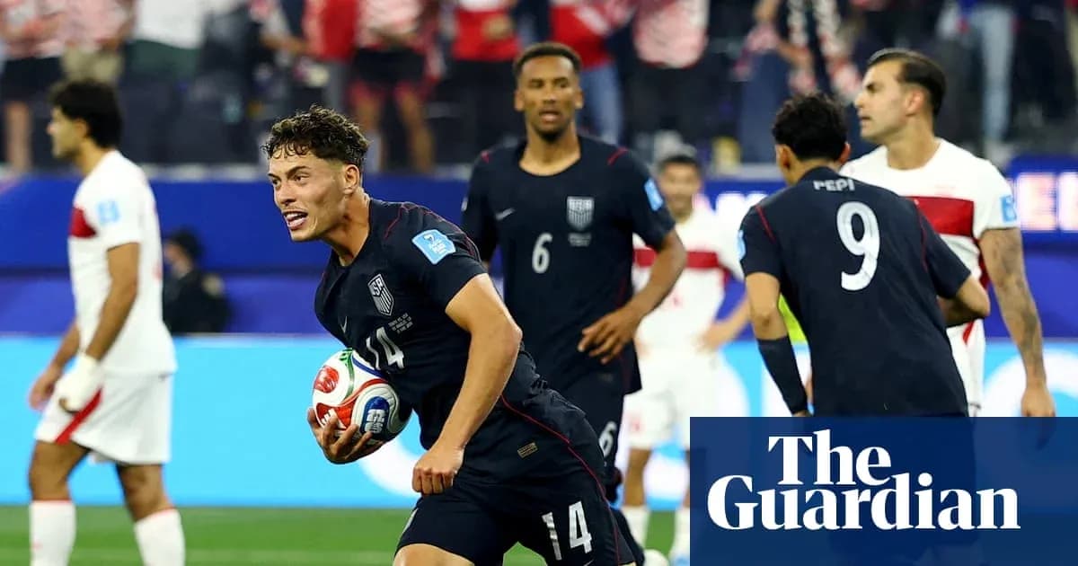 US player celebrating a goal during a match US player celebrating a goal during a match