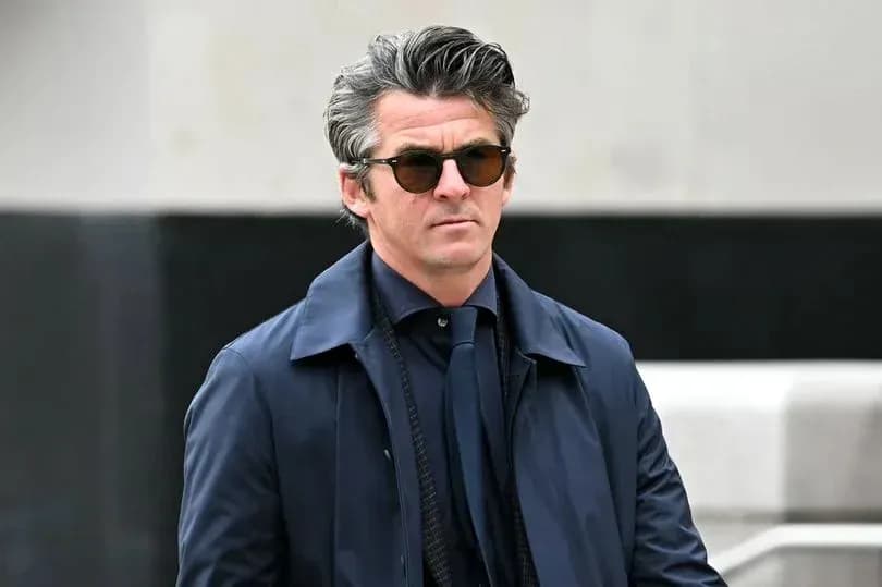 Man in sunglasses walking in urban setting Man in sunglasses walking in urban setting