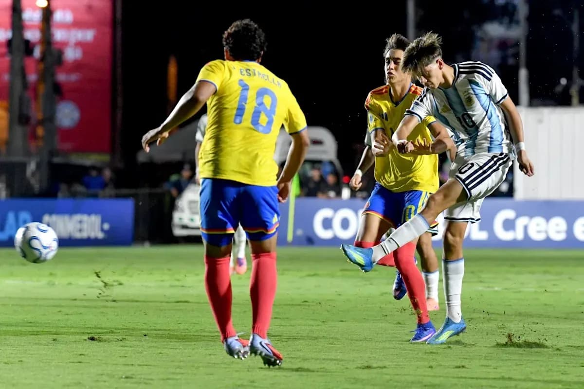 Argentina player shooting while two opponents defend Argentina player shooting while two opponents defend