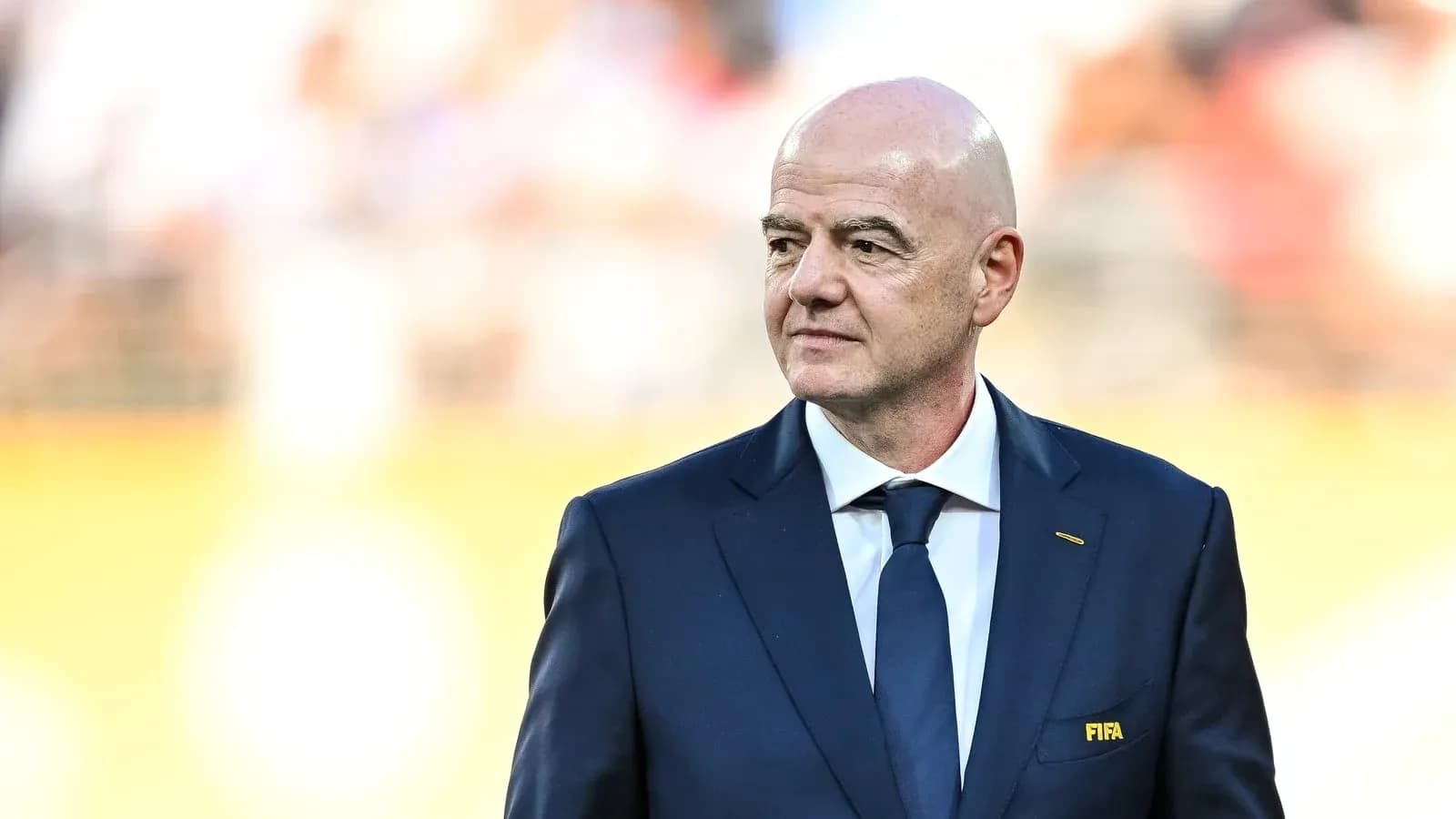 FIFA president on field during event FIFA president on field during event