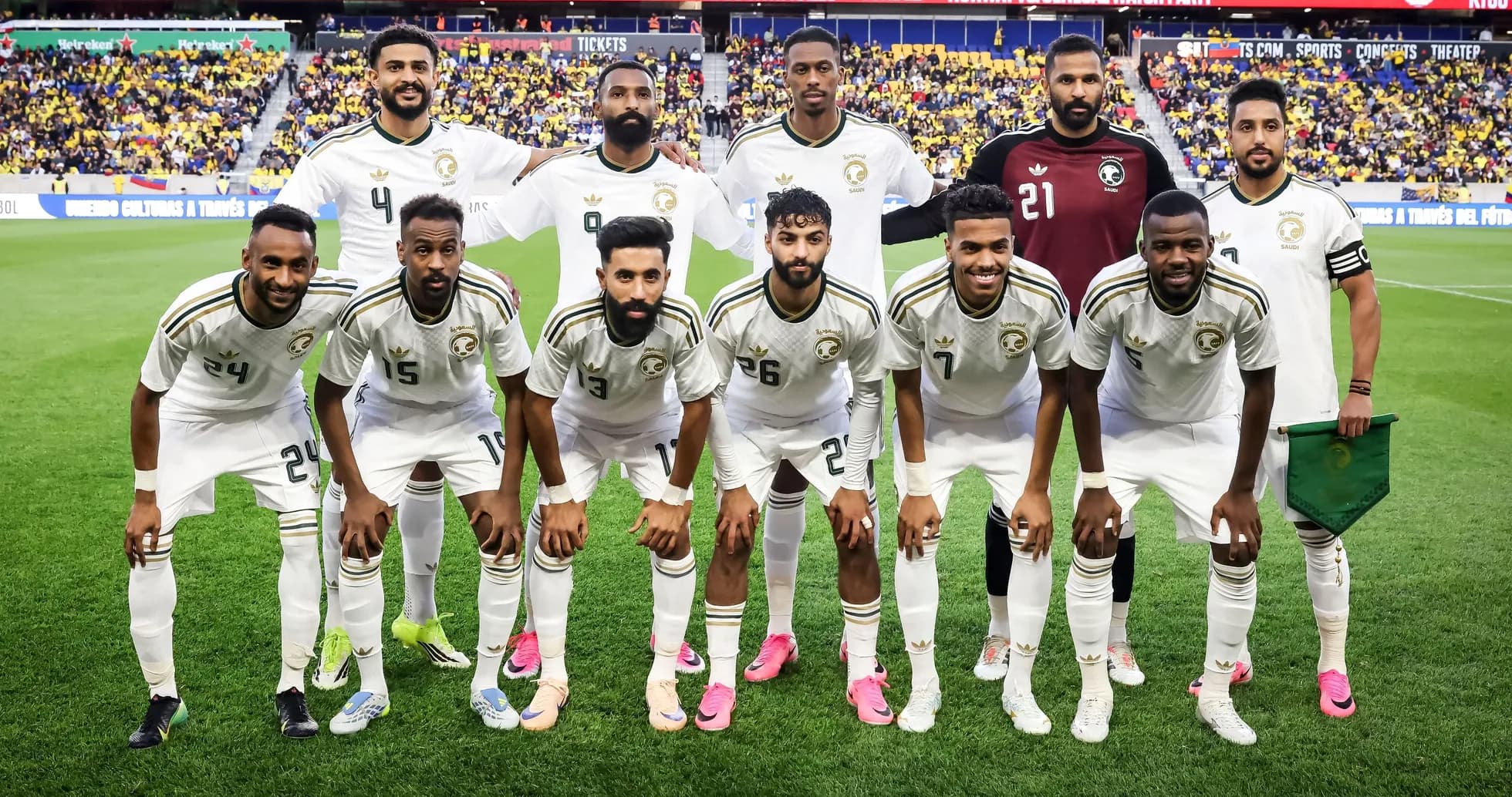 Football team posing for photo before match Football team posing for photo before match